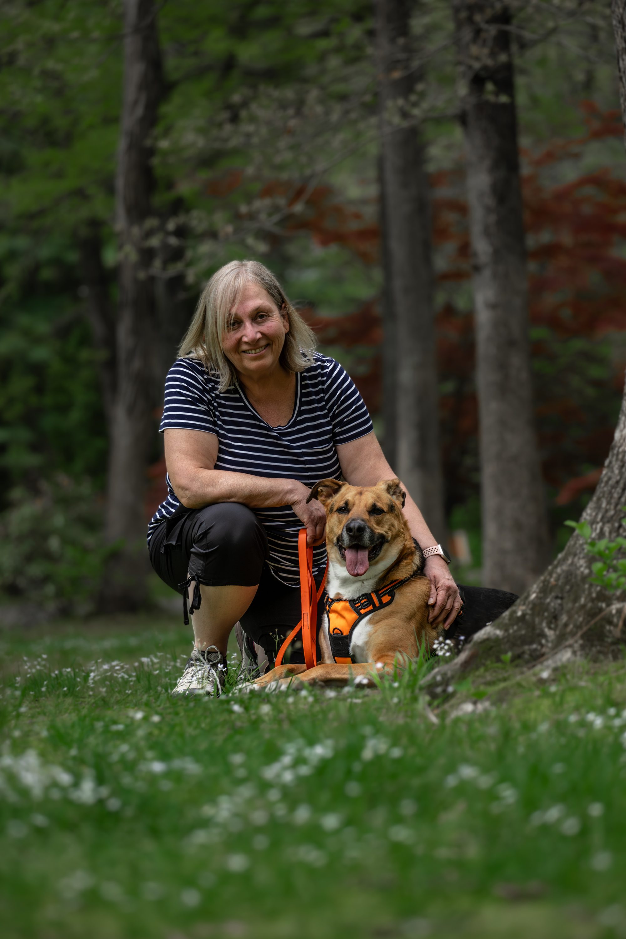 Mama Sue and Norbert together in the forest, where the stories began